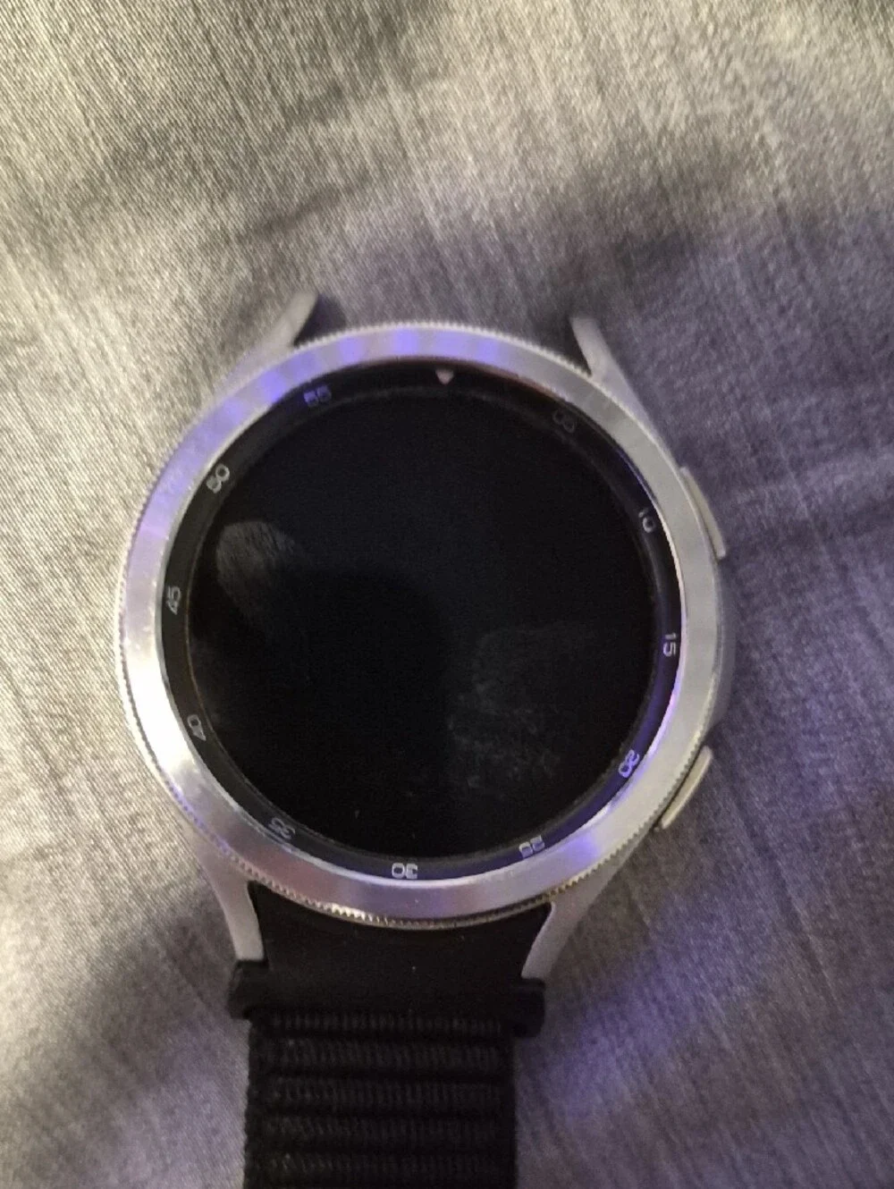 Samsung GALAXY Watch 4 Classic With Silver Shell, Velcro Wristband, and Charger